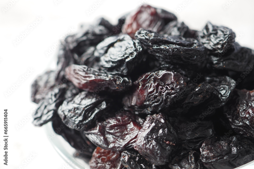 black raisin on white background, close up, black raisin on white background, close up,