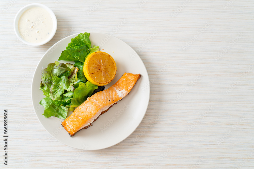 fried salmon steak with lemon and vegetable fried salmon steak with lemon and vegetable