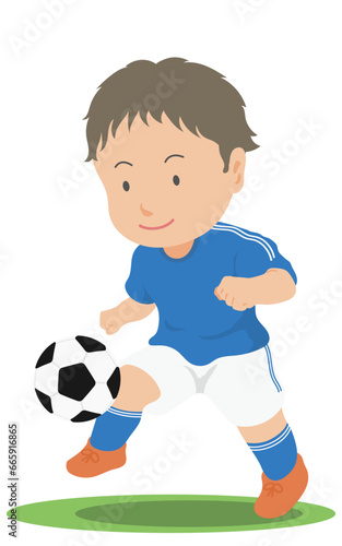 リフティングをするサッカー選手