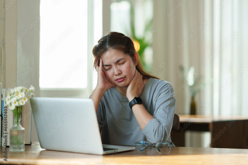 tired business woman sleepy and bored from sitting at a desk for a long time and has office syndrome tired business woman sleepy and bored from sitting at a desk for a long time and has office syndrome