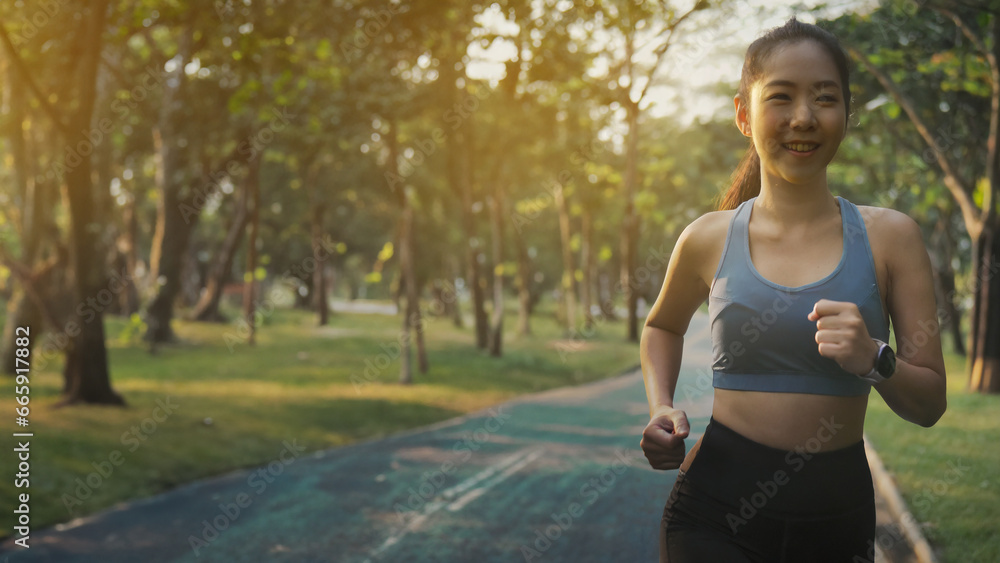Asian woman running in the park or outdoors at the sunset. Generative AI Asian woman running in the park or outdoors at the sunset. Generative AI