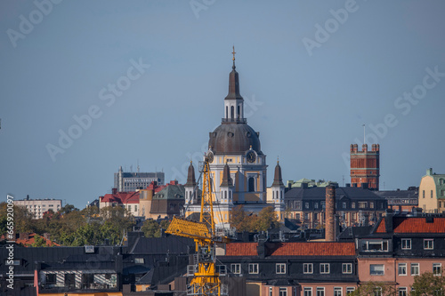 The church Katarina kyrka, brick water tower, and apartments in the district Södermalm, a sunny autumn day in Stockholm © Hans Baath