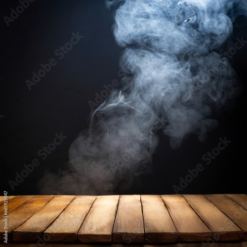 Wooden table and black background with smoke