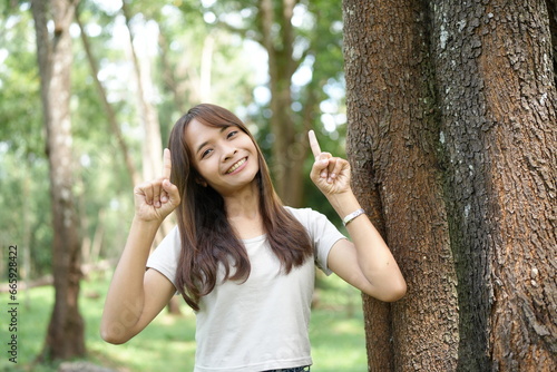 world saving concept Female tourists are happy amidst nature