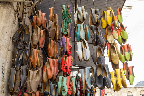 Traditional Turkish leather shoes as know yemeni in the Gaziantep traditional market (bazaar). The colorful hand-made leather shoes