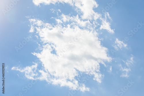 White bird clouds under the blue sky. sunny weather