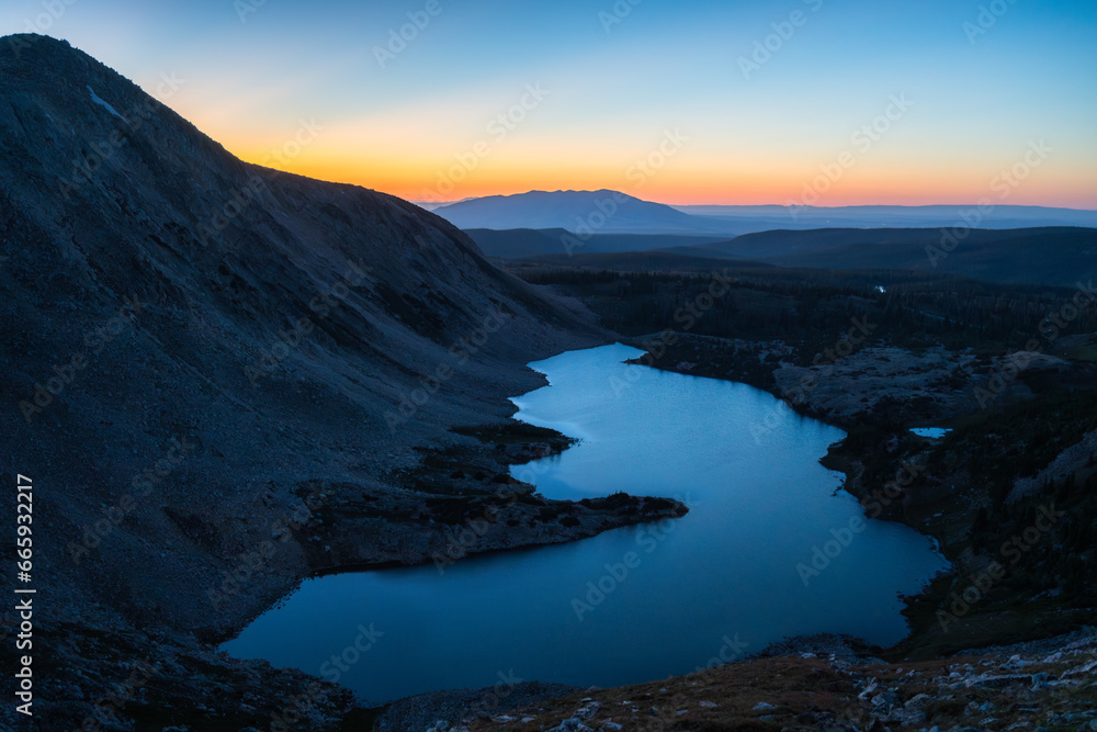 Twilight mountain lake with sunset afterglow