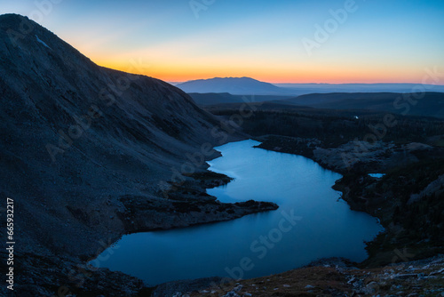 Twilight mountain lake with sunset afterglow