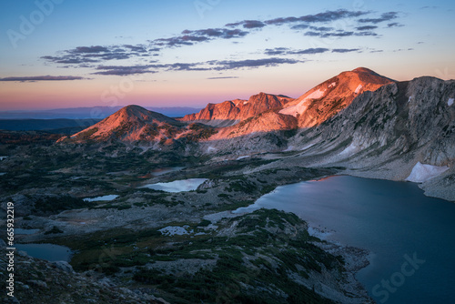 Mountain lakes and peaks at sunrise © Cavan