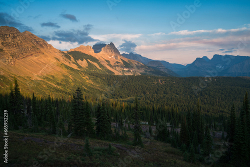 Sunlit peak and surrounding forested landscape in montana