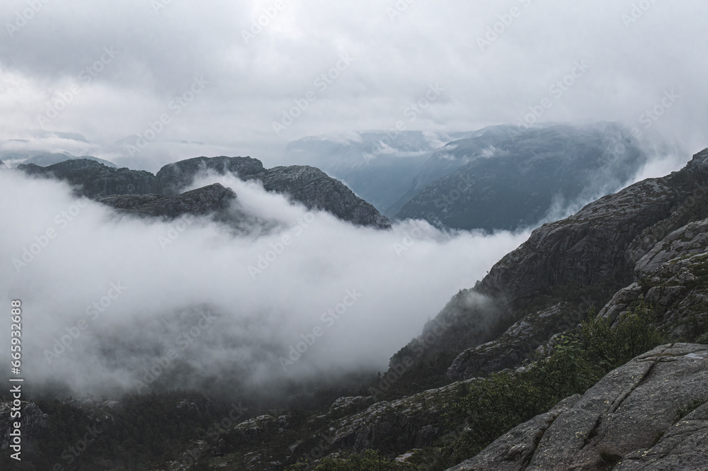 Mountain landscape with clouds and fog in Norway, Scandinavia