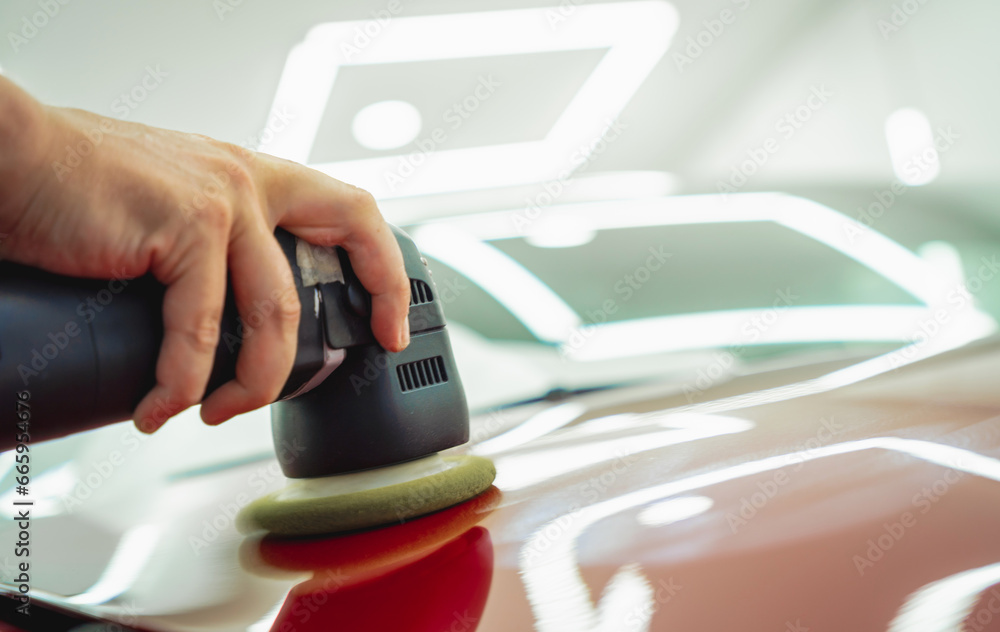 Fototapeta premium Detailing of clean and shining polished red car