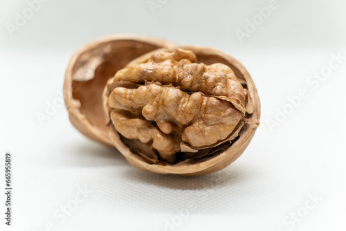 Set of delicious walnuts, isolated on a white background. Half of the walnut, isolated on a white background
