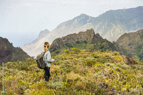 young woman hiking in mountains, anaga mountains Tenerife