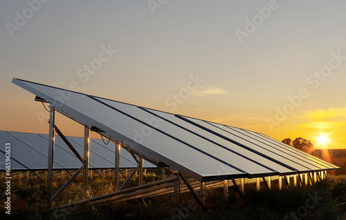 Photovoltaic panels in the light of the setting sun
