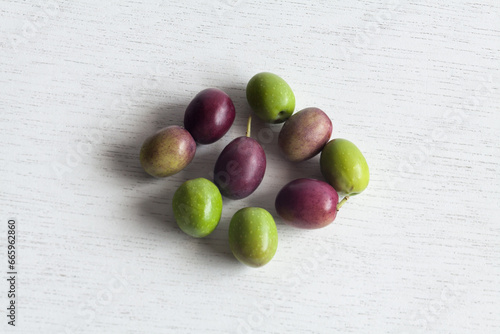 Fresh Olives, Green and Purple Fruits, isolated on white background
