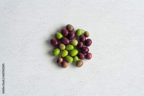 Fresh Olives, Green and Purple Fruits, isolated on white background