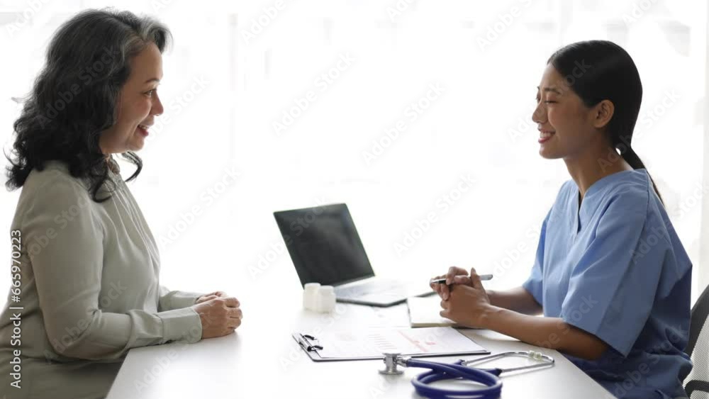 Health counseling for senior women by medical specialists from hospitals. Female doctor and an elderly patient are consulting in an examination room at a hospital. Health counseling for senior women by medical specialists from hospitals. Female doctor and an elderly patient are consulting in an examination room at a hospital.