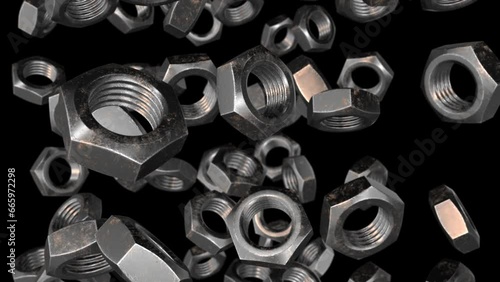 Falling rotating screw nuts. Alpha channel. Seamless loop