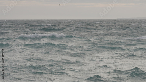 stormy mediterranean sea with cloudy weather and soft light photo