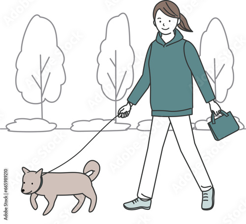 犬の散歩をする女性