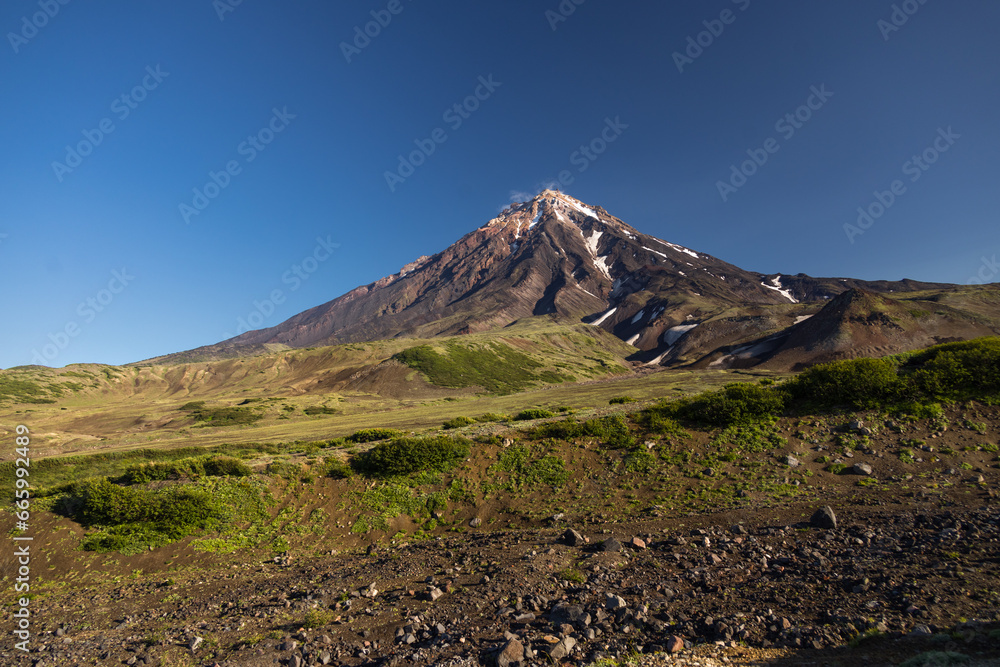 Koryak volcano, visible from the slope of Avachinsky. Kamchatka Krai, Russia