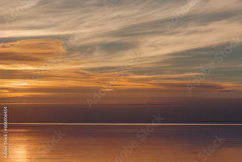 sunset over the sea. Generative AI © jiyoung