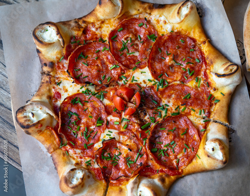 Delicious home baked Italian style pizza close up photography