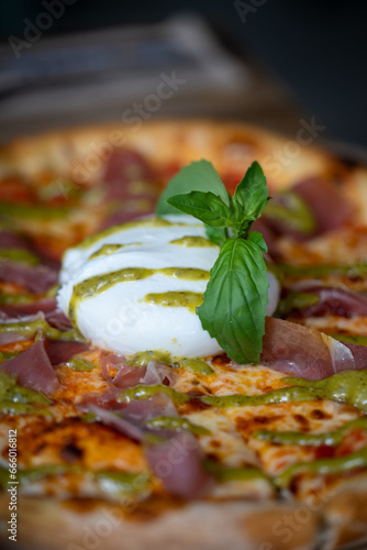Delicious home baked Italian style pizza close up photography
