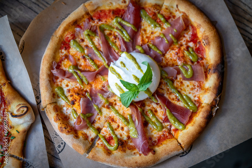 Delicious home baked Italian style pizza close up photography