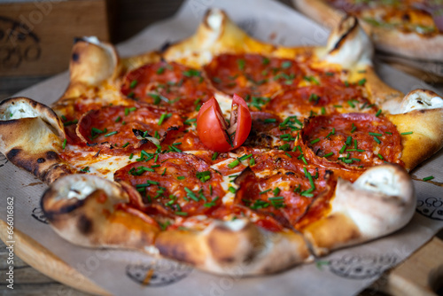 Delicious home baked Italian style pizza close up photography