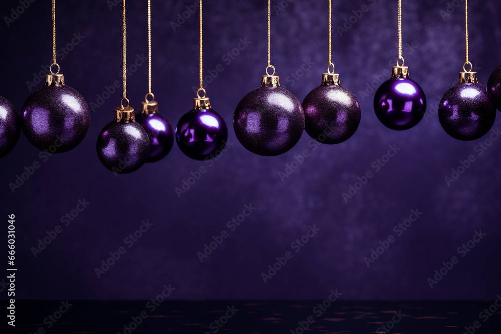 Set of Christmas toys hanging on dark purple background Set of Christmas toys hanging on dark purple background