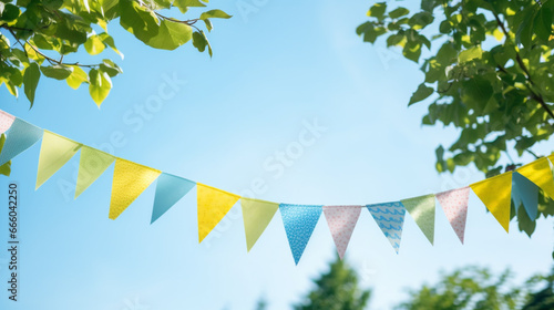 colorful pennant string decoration in green tree foliage on blue sky, summer party. Generative Ai