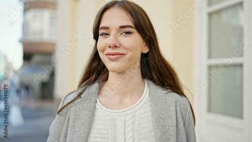 Young hispanic woman smiling confident at street Free Download Young hispanic woman smiling confident at street - GFXLoad