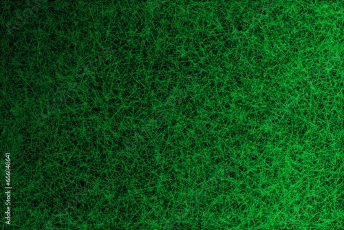 Green and black background, texture in the form of coloured lines reminiscent of crayons. Disordered lines, different directions of lines. Different shades of green and black. 
