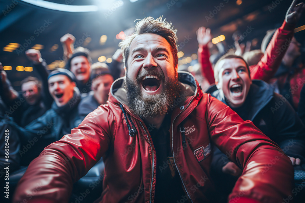 the world of soccer celebrating in a stadium showing cheering middle aged brunette man with beard