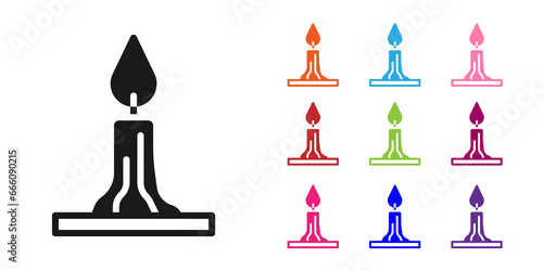 Black Burning candle in candlestick icon isolated on white background. Cylindrical candle stick with burning flame. Set icons colorful. Vector