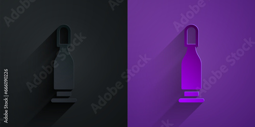 Paper cut Bullet icon isolated on black on purple background. Paper art style. Vector