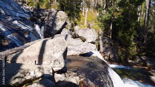 waterfall of Studeny potok stream in the National Park High Tatra, Slovakia photo