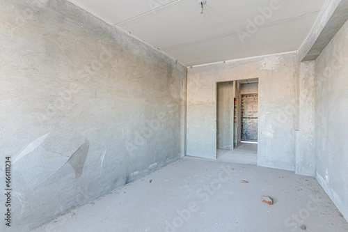 rough repairs for self-finishing. interior decoration, bare walls of the room, stage of construction © evgeniykleymenov