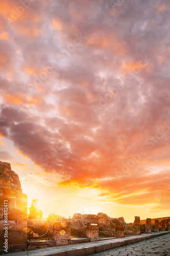 Pompeii, Italy. Sunrays Through Remains Of Ancient Building In Sunset Sunrise Time. photo