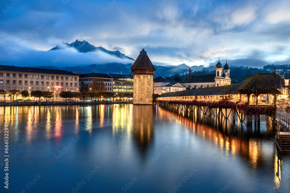 Chapel bridge and the Old town of Lucerne, Switzerland, in blue evening light