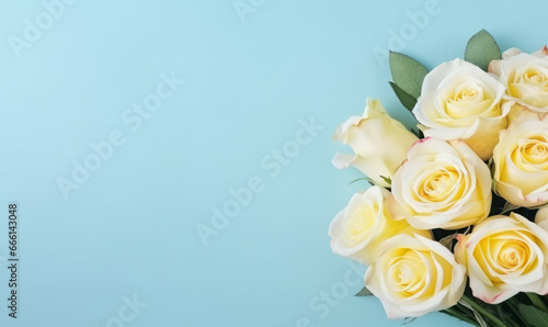 Delicate bouquet of white and yellow roses.