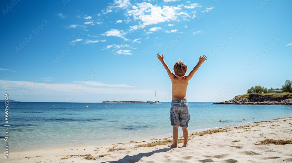 A boy is raising hands and jumping in front of the beach with clear sky in shorts.