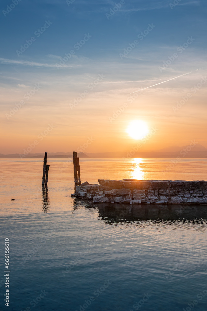 Sun setting at Lago di Garda, Veneto, Italy