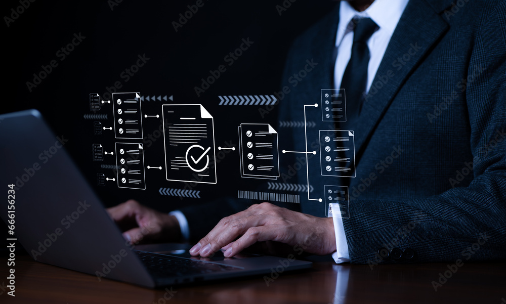 Businessman using laptop computer doing online checklist survey, fill ...