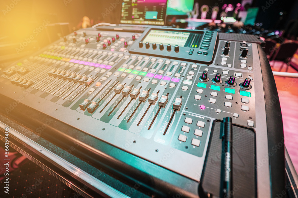 Concert sound mixer panel with volume regulators. Professional audio and light equipment for sound recording studio, live music broadcasting, television, party. mixing console. audio signals.