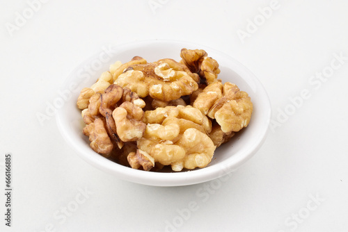 Closeup of walnut seeds on white background