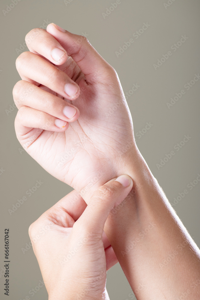 Acupressure hand on grey background Acupressure hand on grey background