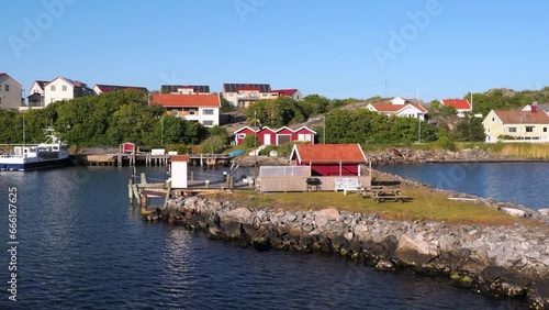 Donso, Sweden - May 31, 2023: A view from the boat at Donso, a fisherman village and island in the Swedish province of Vastra Gotalands lan and the historical province of Vastergotland photo